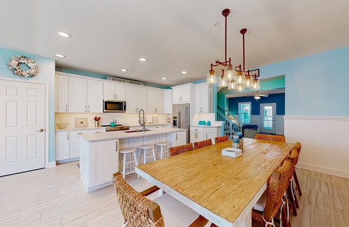 Sunset Island House | 4-story townhome with resort pools, beaches, water access, & great location