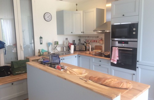 Angouleme House | 44 Rue Maurice Utrillo - the small,tall, riverside house