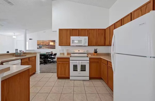Clear Creek House | 4Bd 3 Bath Modern Poolhouse w/Game Room & Pool Close to Disney!