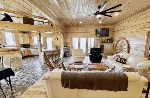 Central Lake House | 4bd/5ba Luxe Log Cabin - Sunset View of Torch Lake, Hiking Trails, Premier Golf
