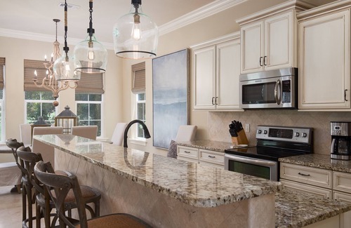 Villa Lago House | 4BR Beach Villa w/2 GOLF CARTS! Near Pool & Wharf. Beach Tram. Covered Patio
