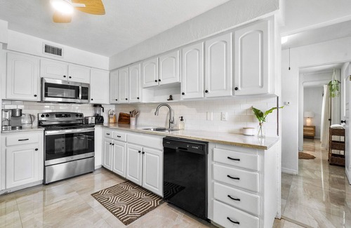 Palm Beach - West Palm Beach House | 4BR centrally located Oasis with Heated Saltwater Pool & backyard for grilling!