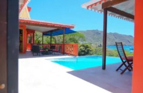 Mount Pleasant Villa | 4BR Overlooking Beach Villa including Cottage