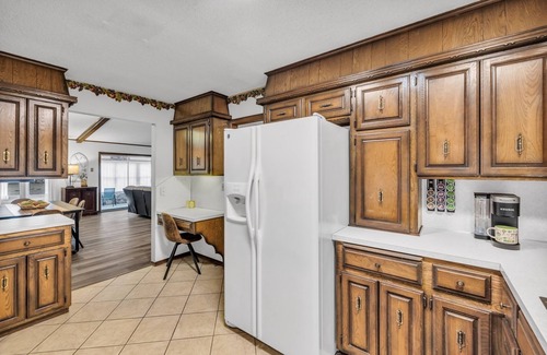 Owasso House | 4BR Retreat w/KING Bed, Hot Tub & Prime Location