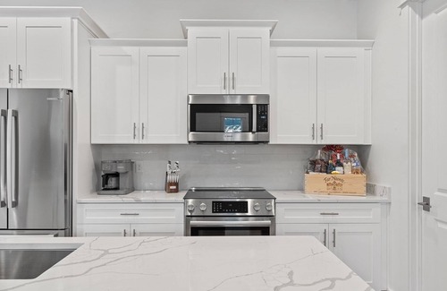 Villa Lago House | 4BR Villa w/6-Seat GOLF CART! Patio, Steps to Pool, Near Wharf, Beach Chairs