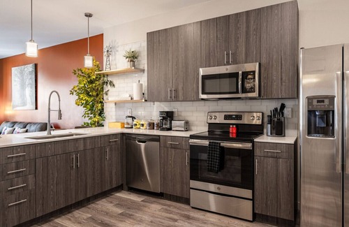 Downtown Louisville Apartment | 4th Street Suites - Serene King Bed Suite