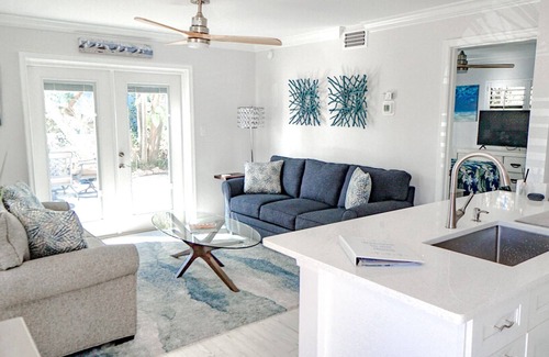 Old Naples Condo | 5-8 MINUTE WALK TO BEACHES, DINING & SHOPPING! RARE PRIVATE PATIO & LAKE VIEW!