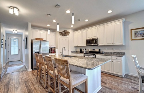 Millville House | 5 Bedroom Dog Friendly Townhome end-unit in the Bishop's Landing community! Community Pool, Shuttle service to the beach, tennis courts, pickleball courts, fitness center and more!