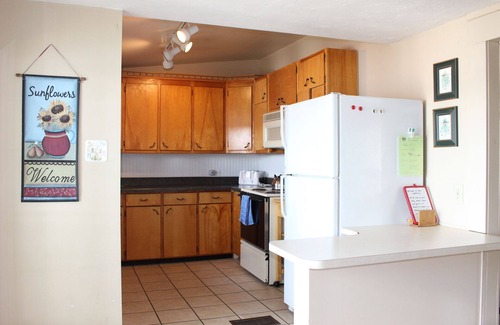Colon House | 5 Bedroom Home with 100 Feet of Sandy-Bottom Frontage on All-Sport Palmer Lake!