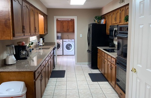Southwind House | 5-BR Home with Pool Near Collierville - Primary Master Bedroom Downstairs.