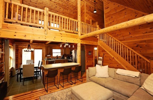 East Jordan Cabin | 5 BR log cabin - 40 private acres - Hiking trails