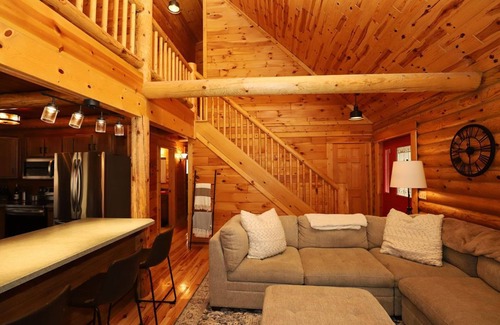 East Jordan Cabin | 5 BR log cabin - 40 private acres - Hiking trails