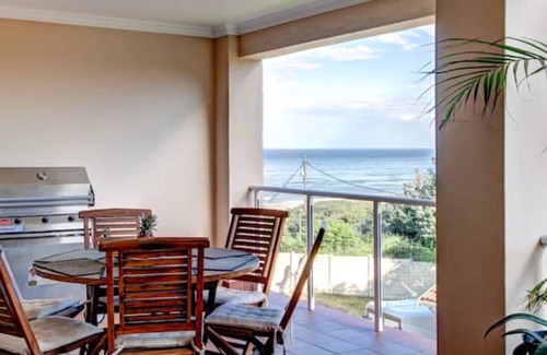 Illovo Beach Apartment | 5 La Mer - Side-sea, garden & pool view
