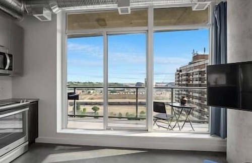 East Village Apartment | 5 min walk to Stampede | 2BR |AC |Near Frt Calgary