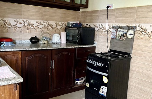 Kijitonyama Apartment | 5 minutes drive ti Mlimani City Shopping Mall. Family sized close to the road