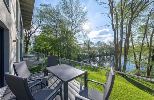 Krakow am See Apartment | 5-star vacation apartment Sonnengruß with a side view of Lake Krakow