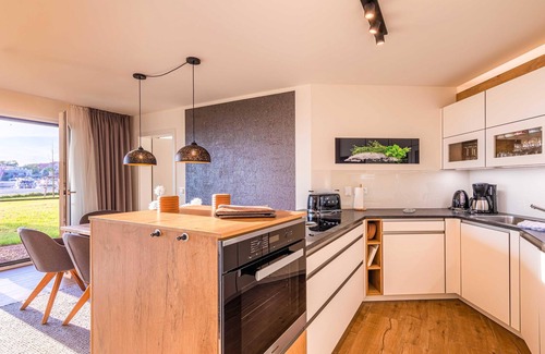 Muritz Apartment | 5-star vacation apartment "Am Lütten Meer" in the harbor residence Waren