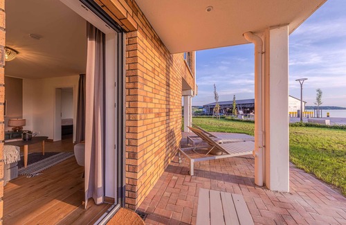 Muritz Apartment | 5-star vacation apartment "Am Lütten Meer" in the harbor residence Waren