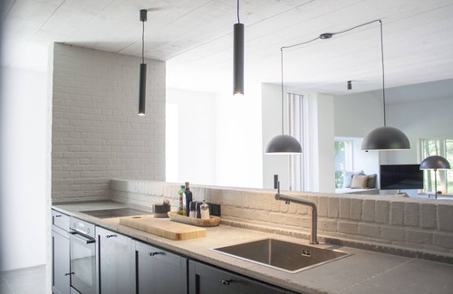 Rodenas House | 5* thatched roof house Ziegelmacher Achten 6600sqm natural garden with pond and outdoor sauna