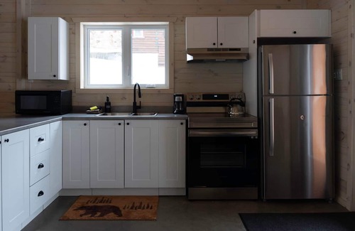 Bowman Ski Chalet | [# 5 The Hare] Rustic chalet by the river.
