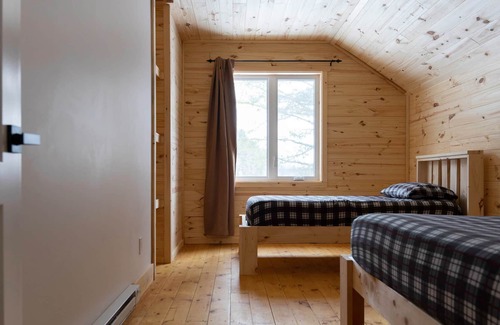 Bowman Ski Chalet | [# 5 The Hare] Rustic chalet by the river.