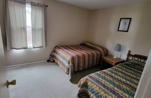 Northeastern Michigan Resort | #5 Thomas' Parkside Cottages, 2BR Lake Huron view suite, Downtown location