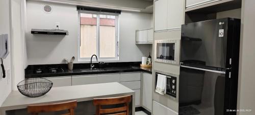 Itapema Apartment | 502 Orion · Apê 3 suítes 3 garagens e churrasqueira