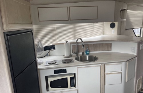 Anchor Bay Harbor Boat Rental | 50ft Stationary House Boat with Upper Sun Deck