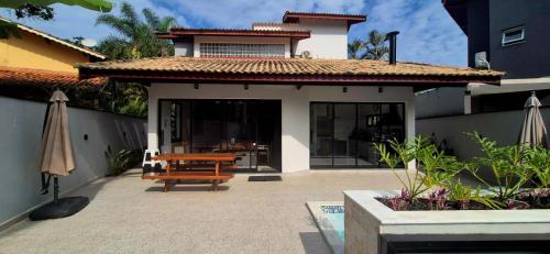 Costa do Sol House | 50m praia Cond pé na areia Alto padrao 4 suites Segur 24h Costa do sol Guaratuba Bertioga prox Riviera