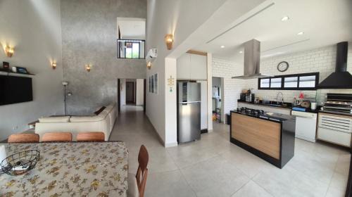 Costa do Sol House | 50m praia Cond pé na areia Alto padrao 4 suites Segur 24h Costa do sol Guaratuba Bertioga prox Riviera