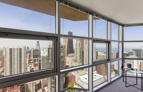 Downtown Chicago Apartment | 51st Floor MagMile Penthouse Views Balcony Pool