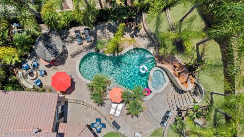 Lakeside House | 5BR 3BA Tropical Paradise with Pool, Spa, and More