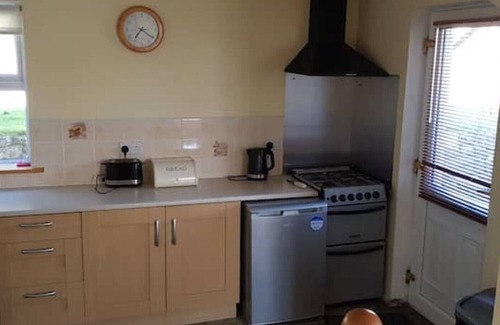 Knockaderry Cross Roads House | 6 granite cottages in a courtyard set in 5 acres of gardens in rural Ireland