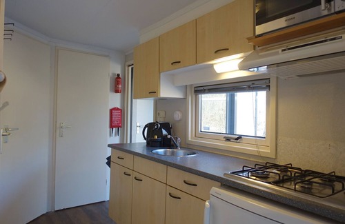 Raalte Ski Chalet | 6 Pers. chalet at 5-star family campsite Krieghuusbelten.