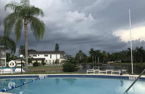 Yacht Club Condo | 60 day min stay required. Gulf Access in Yacht Club SE Cape.