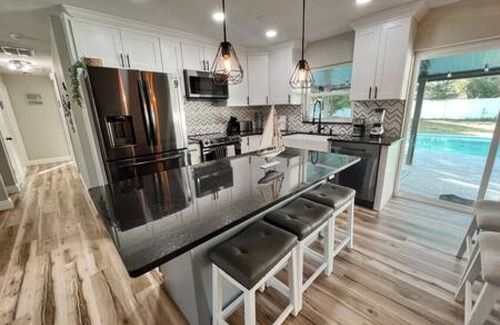 Sun Bay South House | 6306 S Lansdale Cir · Gorgeous 4 Bedroom Tampa Pool Home