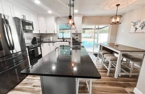 Sun Bay South House | 6306 S Lansdale Cir · Gorgeous 4 Bedroom Tampa Pool Home
