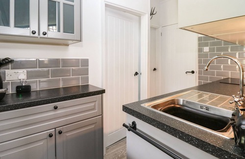 Cenarth Cottage | 64 PENLAN HOLIDAY PARK, pet friendly, with pool in Cenarth