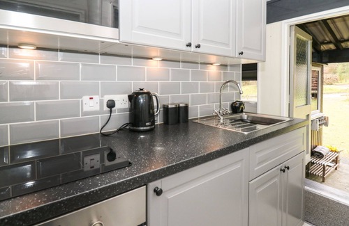 Cenarth Cottage | 64 PENLAN HOLIDAY PARK, pet friendly, with pool in Cenarth