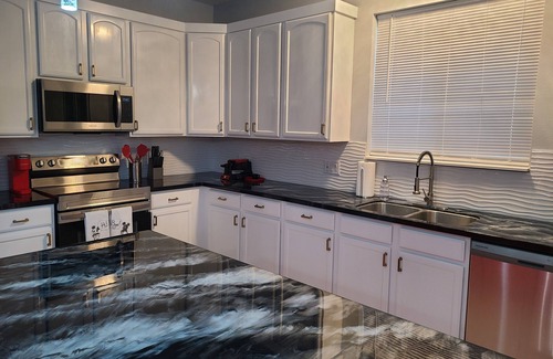 Windwood Bay House | 7/5 themed near Disney/pool/VR room/indoor slide