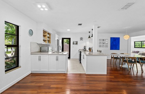 Poinsettia Heights House | 7 Minutes to Beach ~ Saltwater Pool ~ Open Floor Plan