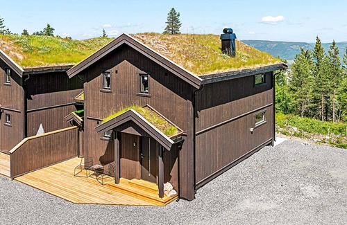 Flesberg House | 7 person holiday home in Lampeland