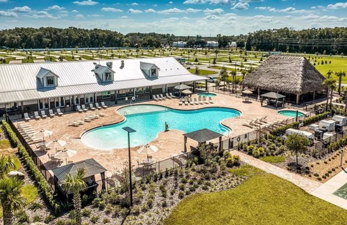 Fellowship RV Rental | 70' RV Pad at Champion's Run Luxury RV Resort with full hookups