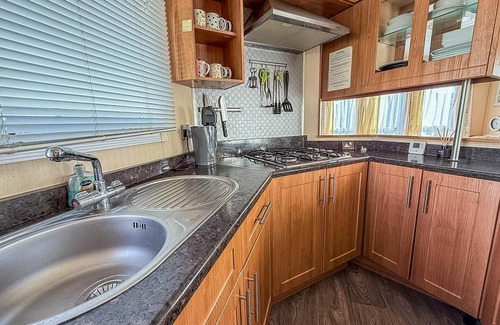 Walton on the Naze House | 8 berth caravan with decking to hire at Naze Marine in Essex ref 17045NM