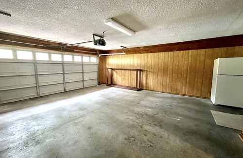 Mount Ida Condo | 80BPD, Four bedroom, two 1/2 bath log-sided condo with lake view , garage by RedAwning