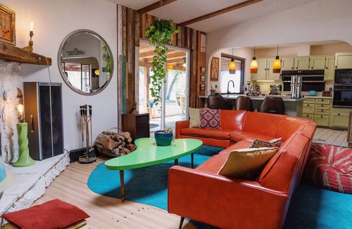 Yucca Valley House | 80s dreamworld with waterfall lagoon, bowling lane, hot tub under the Milky Way