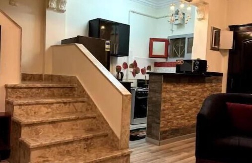 Sheikh Zayed City Apartment | 820 · 2BR Townhouse, Bath, TV, Backyard
