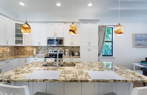 Naples Park House | 833 Naples Oasis: Heated Pool, Steps to Beach!