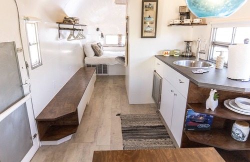 Racquet Club West House | 9BR Luxury Oasis Estate/Spa Lounge and Vintage Trailer