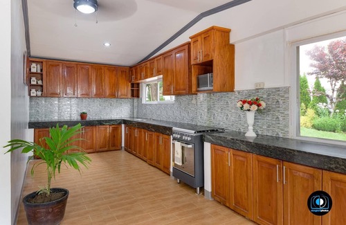 Loon House | A 5-minute walk fromseashore perfect for scuba diving and any water activity.